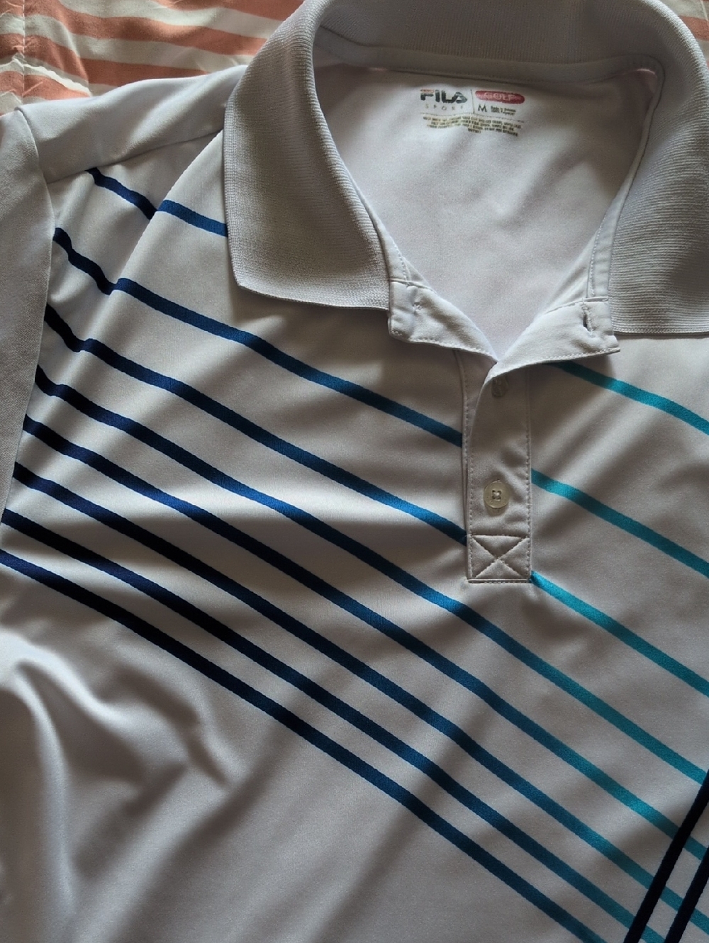 FILA White Golf Polo with Navy and Teal Diagonal Stripes